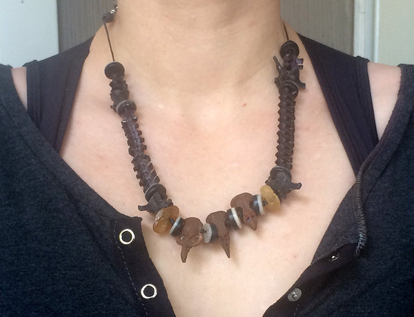 POST APOCALYPTIC NECKLACE- SNAKE BONES , CAST SKULLS