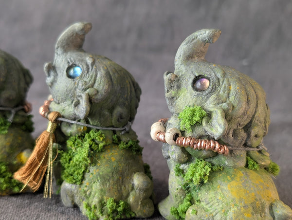 BABY BAKU FAUX STONE FIGURE