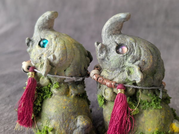 BABY BAKU FAUX STONE FIGURE