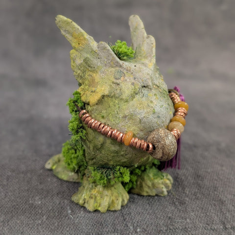 STRIGLET FAUX STONE FIGURE