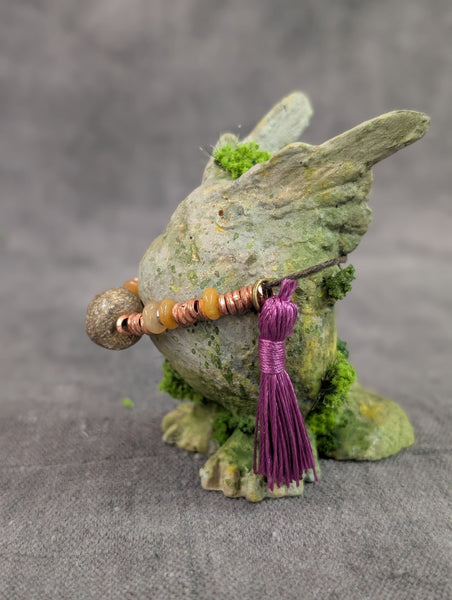 STRIGLET FAUX STONE FIGURE