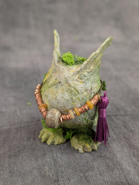 STRIGLET FAUX STONE FIGURE