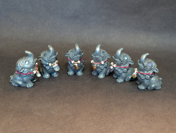 COLD CAST IRON BABY BAKU FIGURE