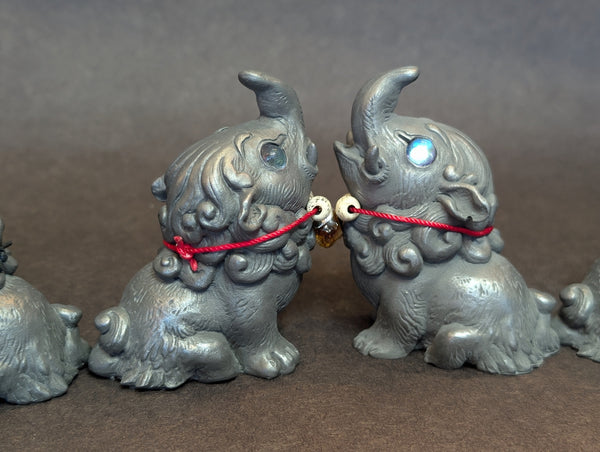 COLD CAST IRON BABY BAKU FIGURE