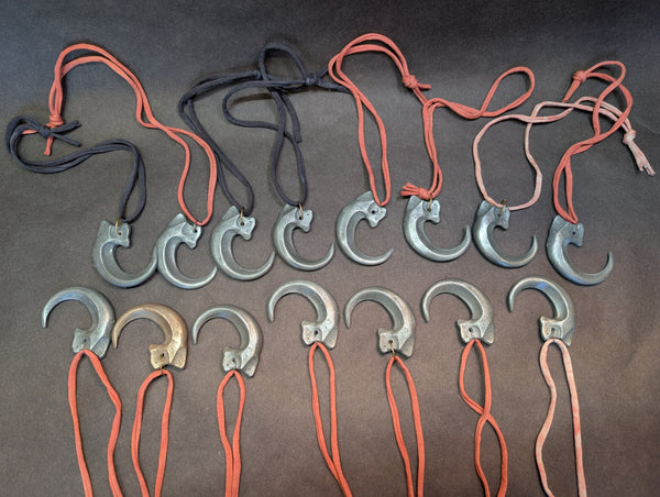 COLD CAST METAL CLAW PENDANT