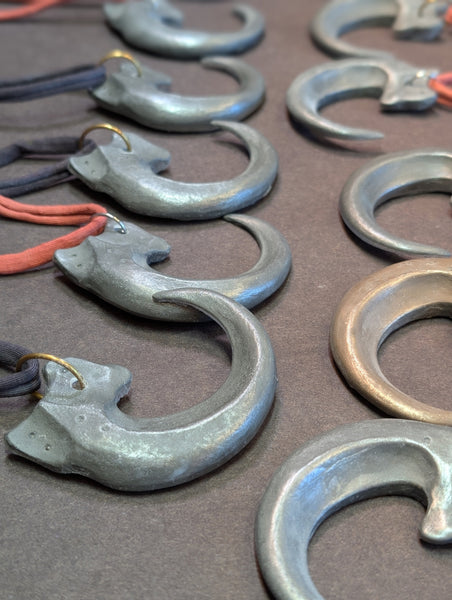 COLD CAST METAL CLAW PENDANT