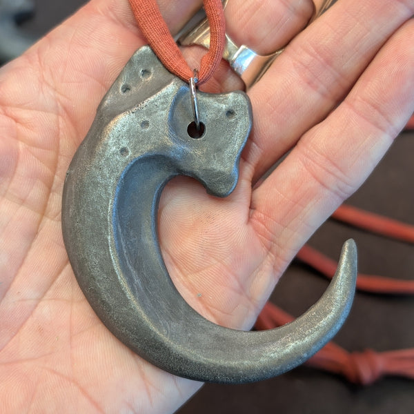 COLD CAST METAL CLAW PENDANT
