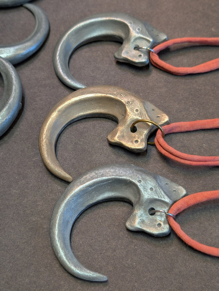 COLD CAST METAL CLAW PENDANT