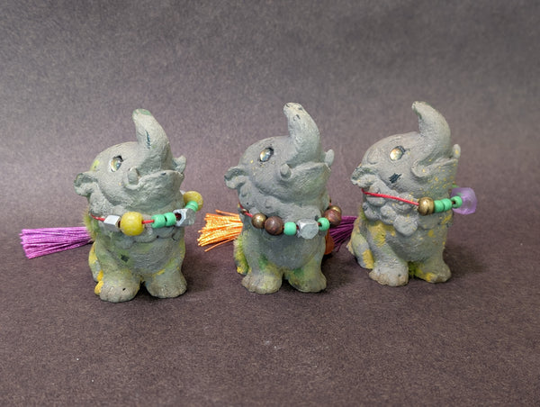FAUX STONE BAKU FIGURINE