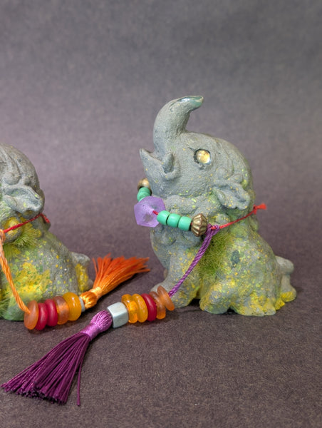 FAUX STONE BAKU FIGURINE