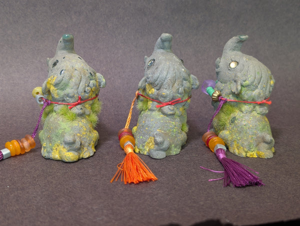 FAUX STONE BAKU FIGURINE