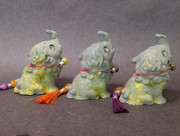 FAUX STONE BAKU FIGURINE