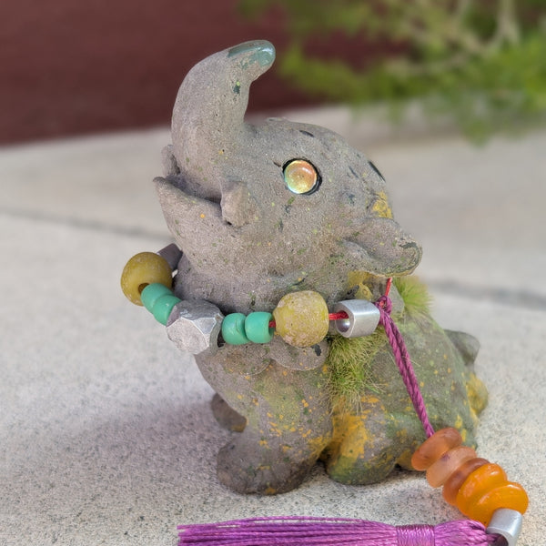 FAUX STONE BAKU FIGURINE