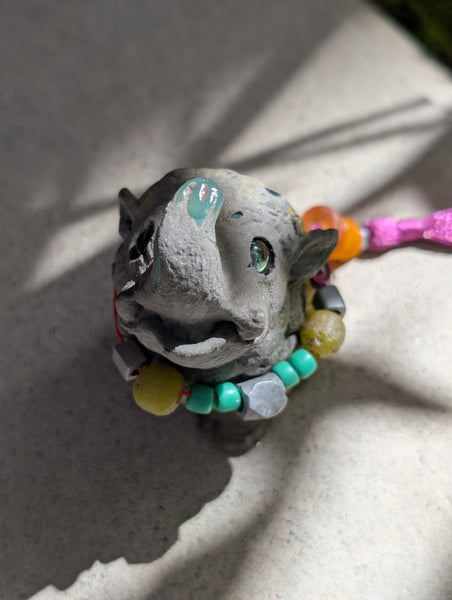 FAUX STONE BAKU FIGURINE