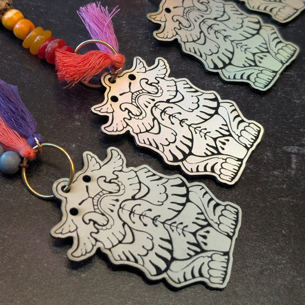 EFFIGY LEATHERETTE CHARM- GLOW OR RAINBOW SILVER