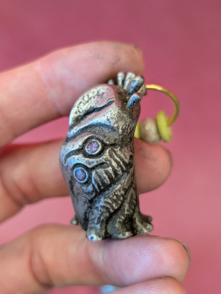 TOKEN OF **UNKNOWN PRONUNCIATION** ACOLYTE- PEWTER METAL- HANGING CHARM