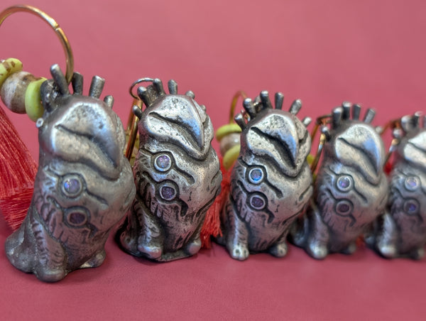 TOKEN OF **UNKNOWN PRONUNCIATION** ACOLYTE- PEWTER METAL- HANGING CHARM